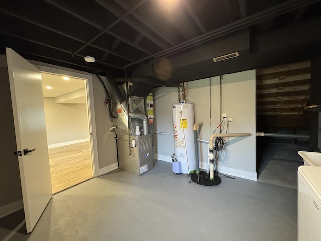 626 E 194th St, Glenwood, IL 60425 - finished below grade area with gas water heater, heating unit, and drainage system