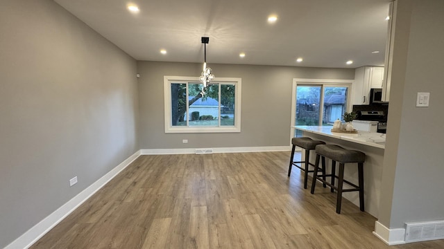 626 E 194th St, Glenwood, IL 60425 - dining space featuring wood finished floors and recessed lighting