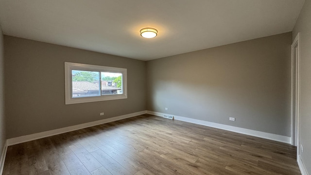 626 E 194th St, Glenwood, IL 60425 - spare room with wood finished floors