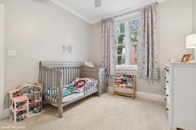 1949 W Nelson St Unit 1E, Chicago, IL 60657 - carpeted bedroom featuring ornamental molding, a crib, and ceiling fan