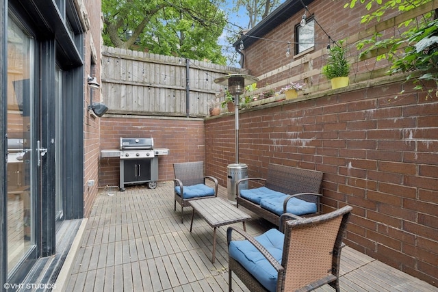 1949 W Nelson St Unit 1E, Chicago, IL 60657 - view of patio featuring grilling area