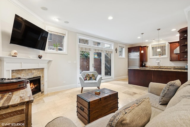 1949 W Nelson St Unit 1E, Chicago, IL 60657 - living room featuring a fireplace, ornamental molding, recessed lighting, and light tile patterned floors