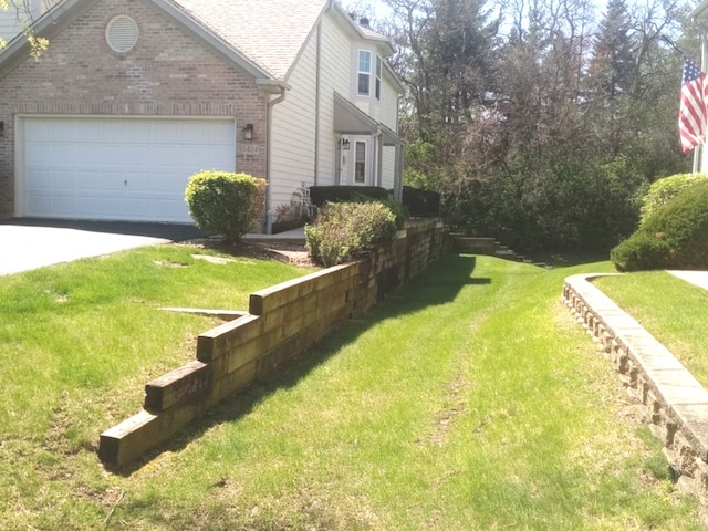 5434 Ashbrook Place -, Downers Grove, IL 60515 - view of green lawn with driveway and an attached garage