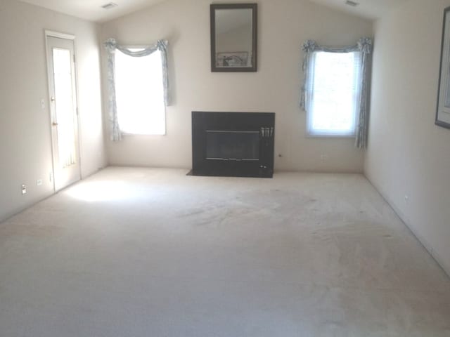 5434 Ashbrook Place -, Downers Grove, IL 60515 - unfurnished living room featuring carpet flooring and a fireplace with flush hearth
