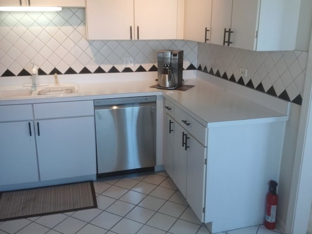 5434 Ashbrook Place -, Downers Grove, IL 60515 - kitchen with stainless steel dishwasher, light countertops, tasteful backsplash, white cabinets, and light tile patterned flooring