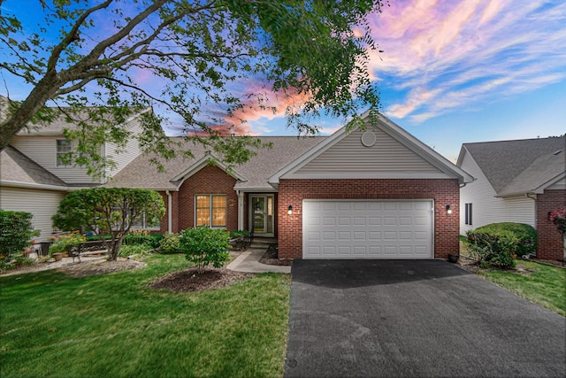 2718 Lake Side Cir, Joliet, IL 60431 - view of front of property featuring brick siding, a garage, asphalt driveway, and a front yard