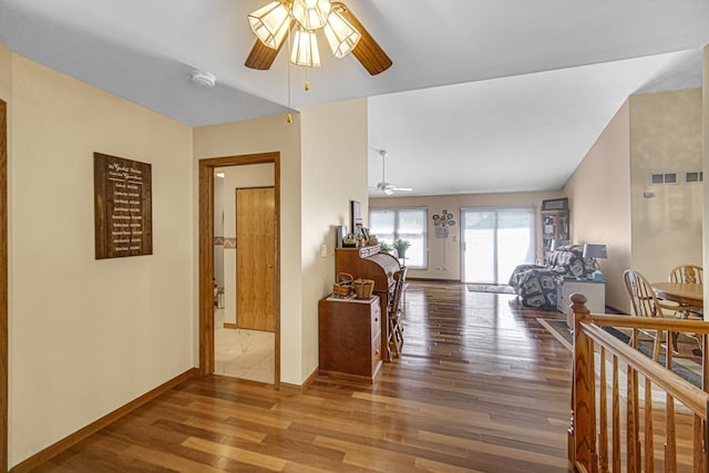 2718 Lake Side Cir, Joliet, IL 60431 - hallway with wood finished floors and baseboards