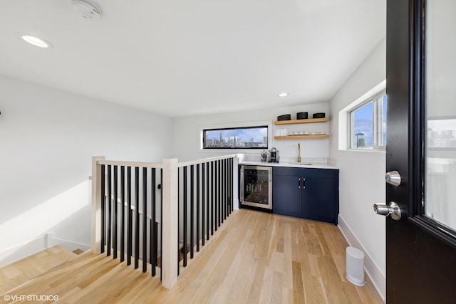 555 W Armitage Ave Unit 2W, Chicago, IL 60614 - indoor wet bar featuring wine cooler, light wood-style flooring, and recessed lighting