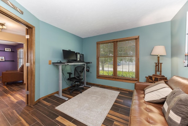 2805 Polo Rd, Bloomington, IL 61704 - living area with dark wood-style flooring and baseboards