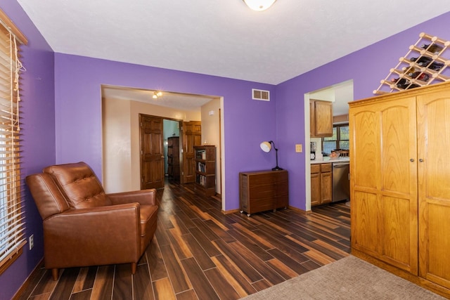 2805 Polo Rd, Bloomington, IL 61704 - living area with dark wood-style flooring