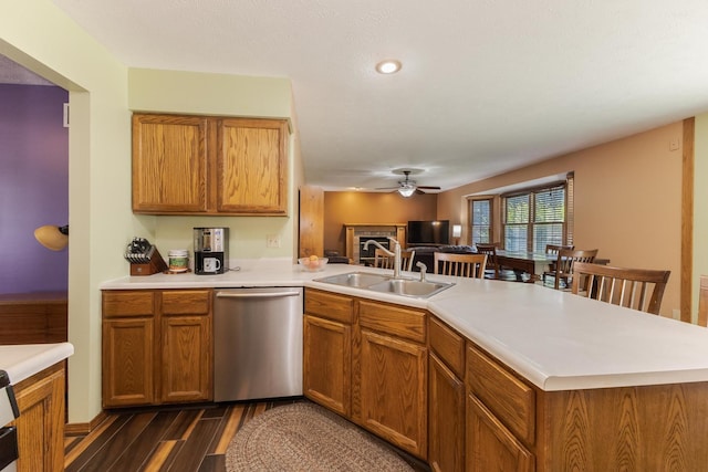 2805 Polo Rd, Bloomington, IL 61704 - kitchen with dishwasher, a peninsula, dark wood-type flooring, ceiling fan, and light countertops