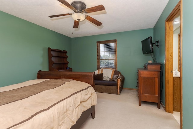 2805 Polo Rd, Bloomington, IL 61704 - carpeted bedroom with ceiling fan and baseboards