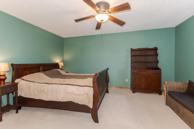 2805 Polo Rd, Bloomington, IL 61704 - carpeted bedroom with ceiling fan and baseboards