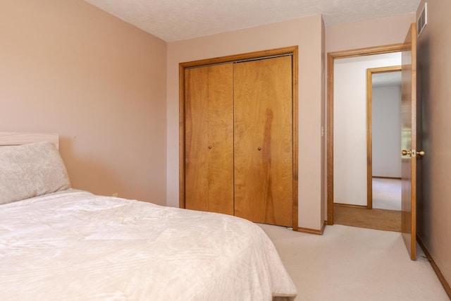 2805 Polo Rd, Bloomington, IL 61704 - bedroom with a closet and light carpet