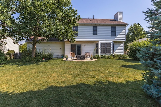 2805 Polo Rd, Bloomington, IL 61704 - back of property featuring a patio area and a chimney
