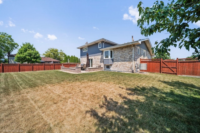 16206 Everdon Dr, Tinley Park, IL 60477 - rear view of property featuring a fenced backyard, a patio area, and a gate
