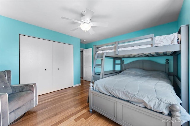 25909 S Woodrush Way, Channahon, IL 60410 - bedroom with light wood finished floors, a closet, and a ceiling fan