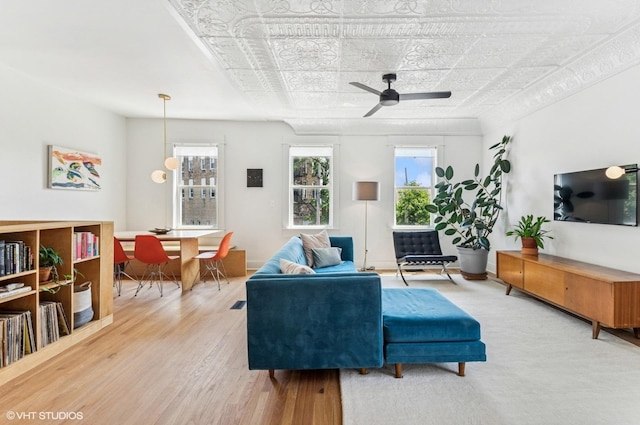 1510 W Cullerton St, Chicago, IL 60608 - living area with an ornate ceiling, plenty of natural light, wood finished floors, and ceiling fan