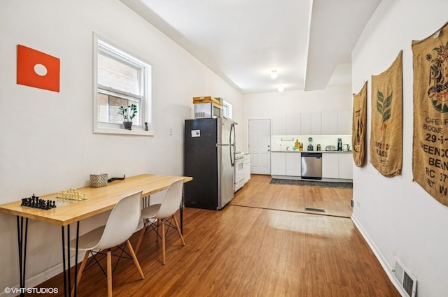 1510 W Cullerton St, Chicago, IL 60608 - kitchen with stainless steel appliances and light wood-style floors