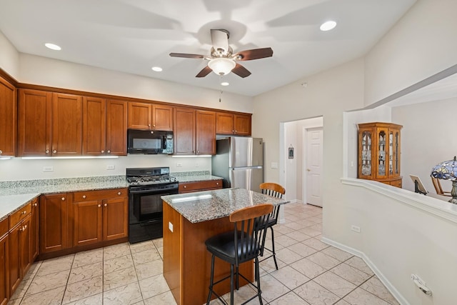 940 Augusta Way Unit 315, Highland Park, IL 60035 - kitchen featuring black appliances, a breakfast bar area, a ceiling fan, brown cabinetry, and recessed lighting