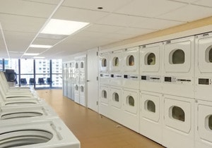 10 E Ontario St Unit 3912, Chicago, IL 60611 - community laundry with washing machine and dryer and stacked washer / drying machine