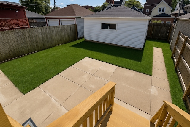 1428 N Central Ave, Chicago, IL 60651 - fenced backyard with a patio and an outdoor structure