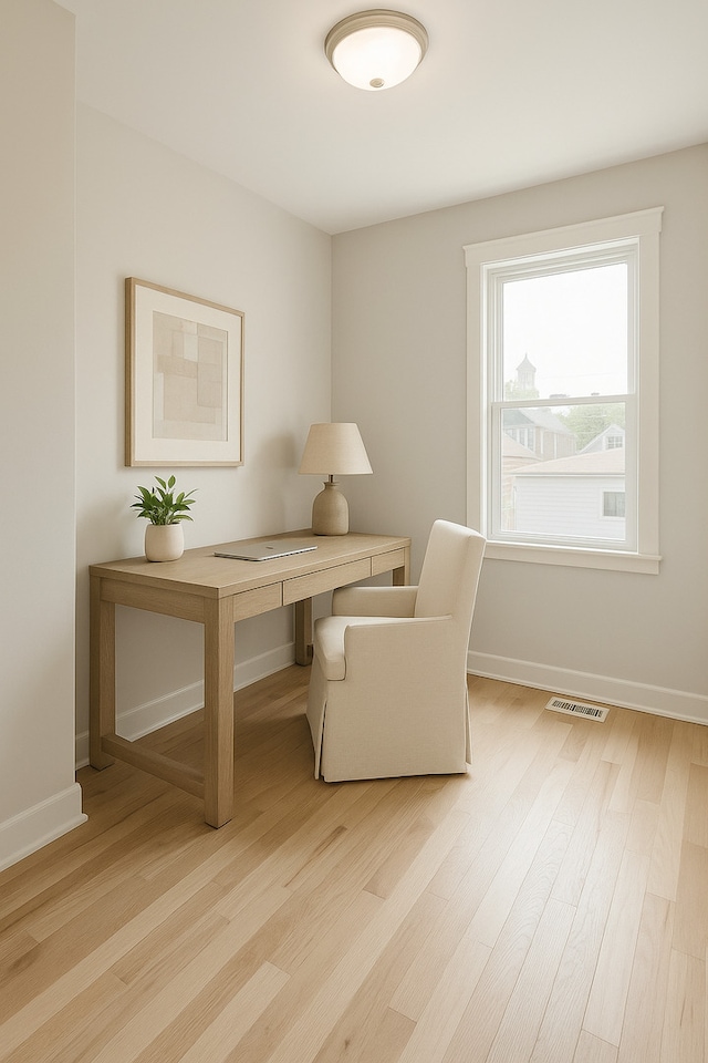 1428 N Central Ave, Chicago, IL 60651 - office with light wood-style floors and baseboards