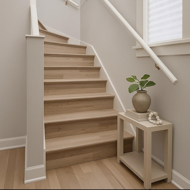 1428 N Central Ave, Chicago, IL 60651 - staircase featuring wood finished floors and baseboards