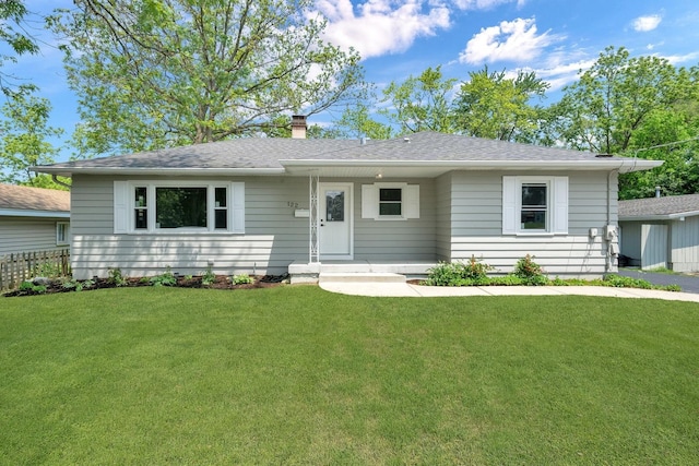 122 Tower Rd, Barrington, IL 60010 - view of front of property with a chimney and a front yard