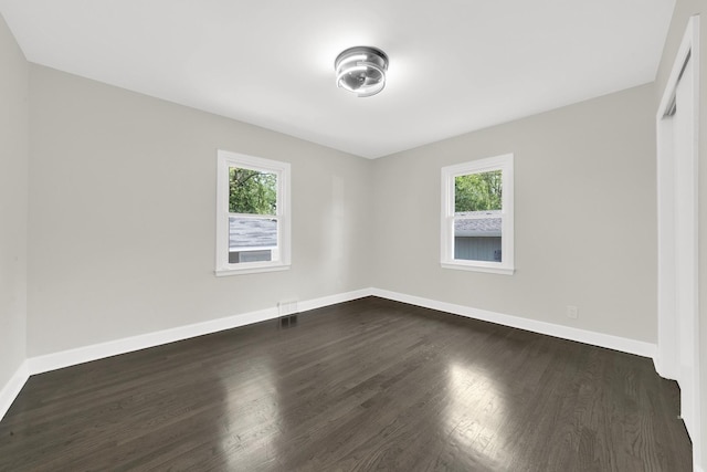 122 Tower Rd, Barrington, IL 60010 - unfurnished room with healthy amount of natural light and dark wood finished floors