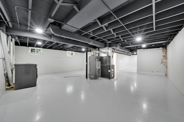 122 Tower Rd, Barrington, IL 60010 - basement featuring water heater, washer / dryer, and heating unit