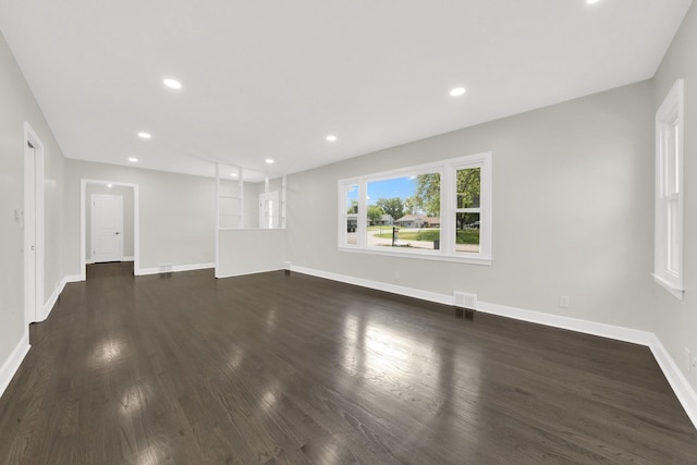 122 Tower Rd, Barrington, IL 60010 - unfurnished living room with dark wood-style floors and recessed lighting