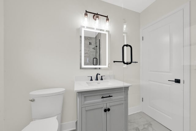 122 Tower Rd, Barrington, IL 60010 - full bathroom with marble finish floors, vanity, and a shower with door