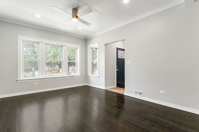 2407 S 60th Ct, Cicero, IL 60804 - spare room featuring ornamental molding, a ceiling fan, dark wood-style flooring, and recessed lighting