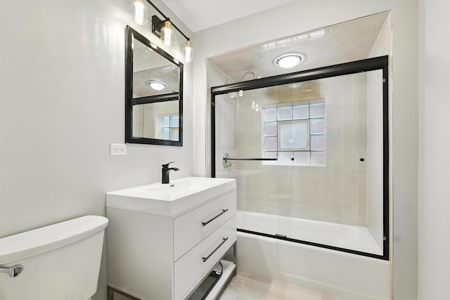 2407 S 60th Ct, Cicero, IL 60804 - bathroom featuring vanity and bath / shower combo with glass door
