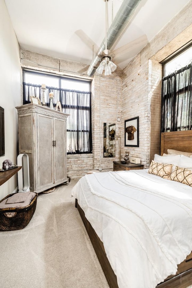 1820 N Spaulding Ave Unit 102, Chicago, IL 60647 - bedroom with light carpet and a ceiling fan