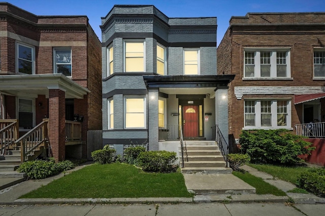 7144 S Champlain Ave, Chicago, IL 60619 - multi unit property featuring brick siding and a porch
