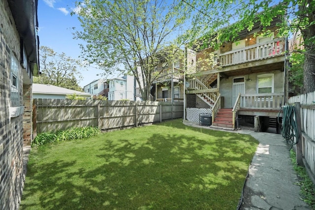 7144 S Champlain Ave, Chicago, IL 60619 - fenced backyard featuring stairs and a wooden deck