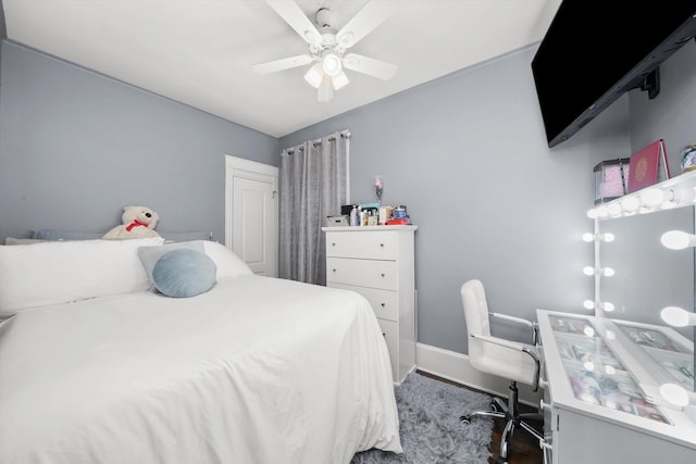7144 S Champlain Ave, Chicago, IL 60619 - bedroom with wood finished floors and ceiling fan