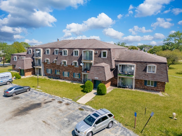 17963 Huntleigh Ct Unit 103, Country Club Hills, IL 60478 - view of property featuring uncovered parking