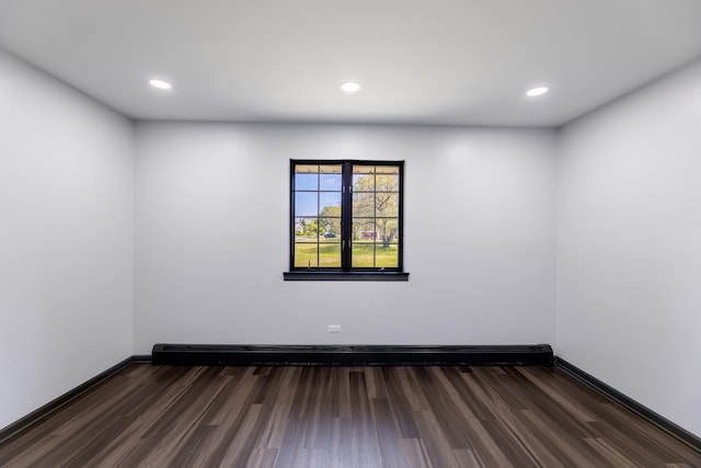 17963 Huntleigh Ct Unit 103, Country Club Hills, IL 60478 - unfurnished room featuring dark wood-style floors, a baseboard heating unit, and recessed lighting