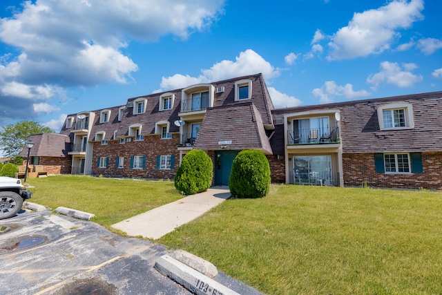 17963 Huntleigh Ct Unit 103, Country Club Hills, IL 60478 - view of property featuring uncovered parking