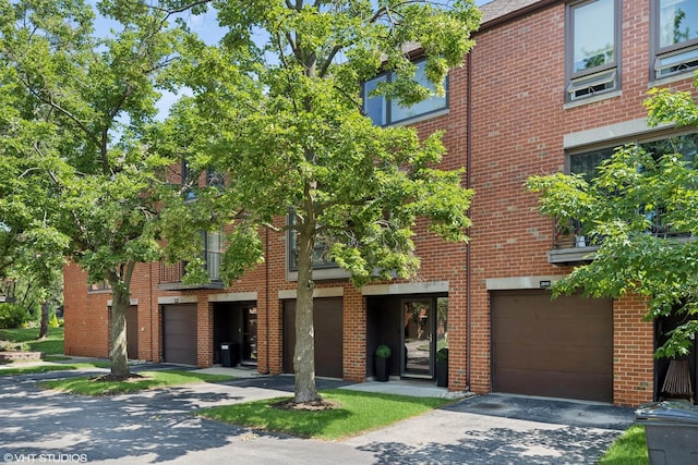 3843 Appian Way, Glenview, IL 60025 - view of property with an attached garage and driveway