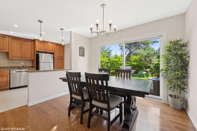 3843 Appian Way, Glenview, IL 60025 - dining area featuring light wood-type flooring, a chandelier, and recessed lighting
