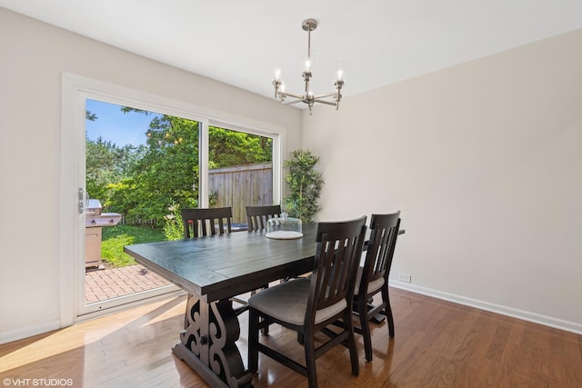 3843 Appian Way, Glenview, IL 60025 - dining space featuring a chandelier and wood finished floors