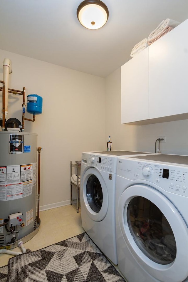 2746 Acorn Ct Unit 2746, West Dundee, IL 60118 - laundry room featuring water heater, washer and dryer, and cabinet space