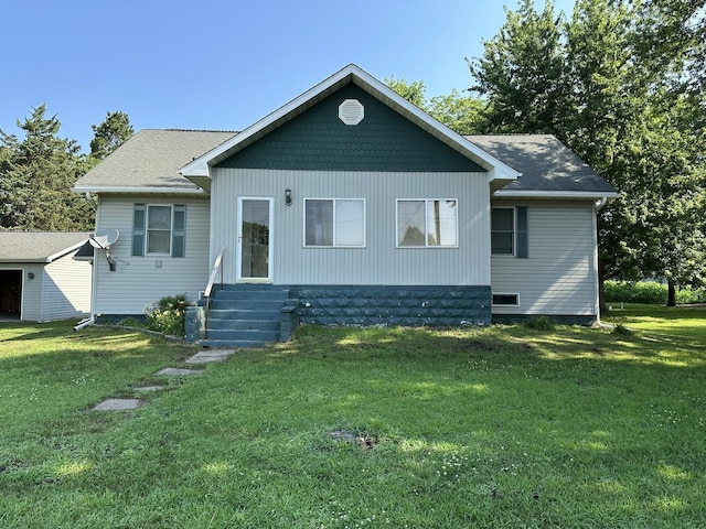 12851 Argo Fay Rd, Thomson, IL 61285 - rear view of house with a yard, entry steps, and a shingled roof