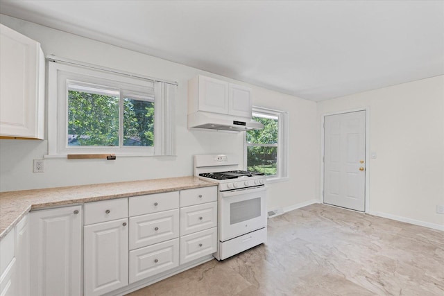 1807 Broadmoor Dr, Champaign, IL 61821 - kitchen featuring white range with gas cooktop, exhaust hood, white cabinetry, and light stone counters