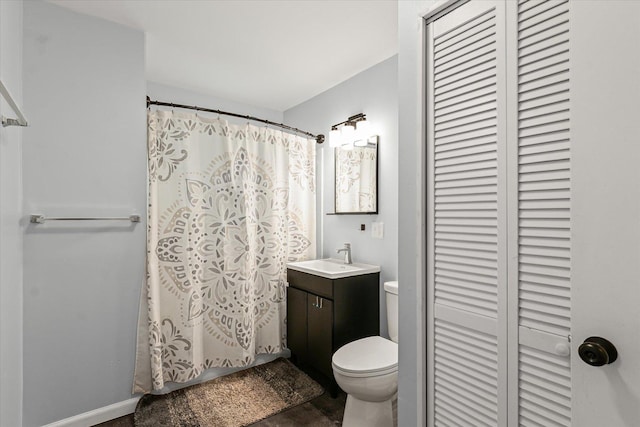1807 Broadmoor Dr, Champaign, IL 61821 - full bath featuring a closet, vanity, and a shower with shower curtain