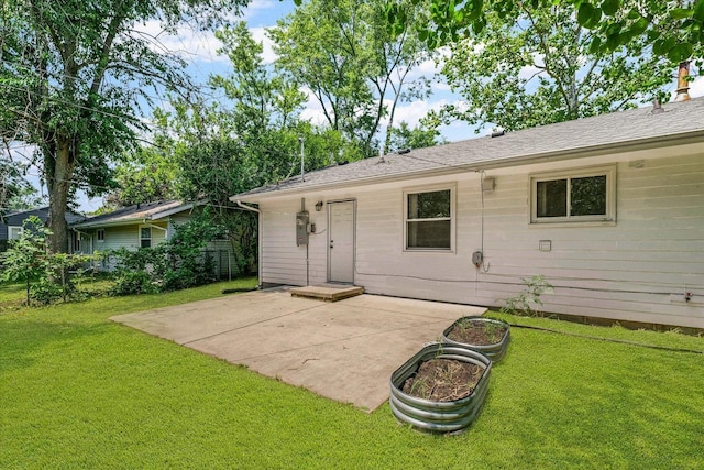 1807 Broadmoor Dr, Champaign, IL 61821 - back of house with a patio area and a yard